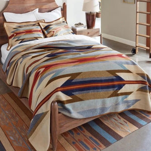 Add tranquility and style to your bedroom with the stunning Wyeth Trail Collection.   This blanket design reflects the warm, harmonious colors of ancient corn varieties, in a balanced pattern of rows that echo long-ago gardens. Arrows point in two directions: the past and the future.  Fully reversible for two different seasonal looks. Available at Swan Creek Interiors Australia 