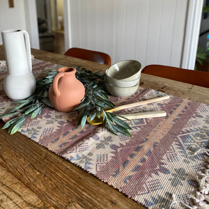 Bring a touch of the Southwest to your living space  These beautiful (runner) rugs are the perfect thing to spice up your table, sideboards, floors, doorway, anywhere and everywhere.  Each rug is handmade by artisans, stencil printed on cotton canvas with fringe ends.  Size 63” - 60x130cm