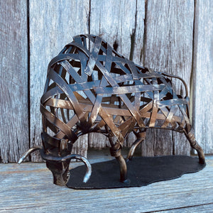 Add some Western flare to your home with this handcrafted Mexican Bull statue.  Wrought iron - steel work, patina distressed bronze finish.  He stands at 7” and nearly 13” long.