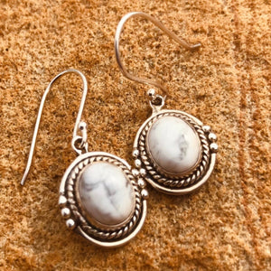 Designed by Roxy West; with style and comfort in mind. Handcrafted for us in silver with timeless ‘rope & bead’ silver work that frames the pair of polished gemstones.  Artisan-made. Lovely .925 Sterling silver. Natural gemstones. Pendant size 15 x 17.5mm