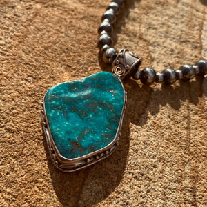 Big Beautiful Necklace Set  The Pendant; handcrafted by New Mexico Artisan, the pendant features a dazzling vintage piece of natural Lone Mountain Turquoise with bright teal-blue matrix and golden flecks. Made in pure silver the setting has bespoke detail. The big pedant size is approximate 5.5 x 4cm + the big bail.  The Chain; custom Navajo Pearls necklace especially for this pendant in 16” inch strand of 6 & 10mm pearls.