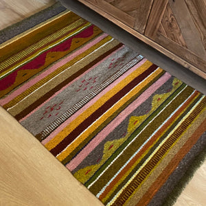 The beautiful colours of Mexico.  100% wool accent rug. Perfect for the floor or large table top setting.   Durable and luxurious. We have this one only, then it’s gone!  Trading Post wool rugs are known for their beauty, intricate design and craftsmanship. No two items are the same, this is what makes each piece a work of art. 
