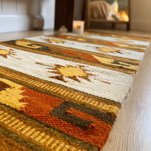 Southwest Luxe  Imaging this in your ranch home!  Handwoven trading post wool accent rug. Golden tan with stunning earthy southwest hues. Perfect for the floor or large furniture setting. 