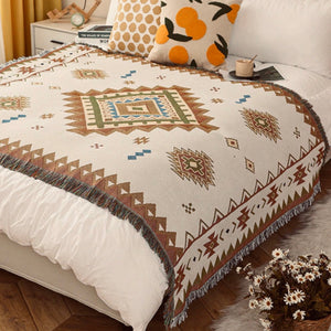 This lovely throw-blanket features; Southwest pattern, earthy neutral hues and fringed edge. Fully reversible accent so you can change your seasonal style.  Perfectly sized for napping, reading or simply admiring. Can be worn as an shawl as seen in stylish cowgirl magazines.   Interior gorgeousness!! A throw is more than a throw. Their versatility can be used to warm up a room, add glamour, colour and texture or simply provide the finishing touch to any space