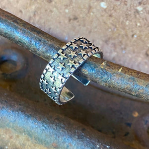 Western Rockstar Bling  Artisan .925 Silver with etched Star design. Patina silver.  Ring considered small - medium and can be adjusted smaller or larger to suit.  USA