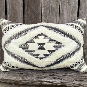 These versatile cushions can be used to warm up a room and simply provide the finishing touch to any space.  A boho rendition of Southwestern design. This throw cushion features Navajo-inspired geometric motifs layered with soft white texture.  Measurement: Lumbar 30x50cm