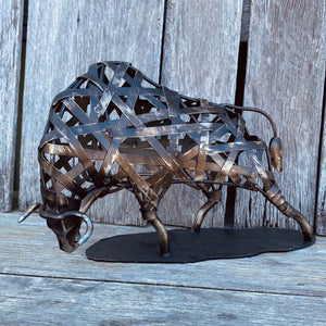 Add some Western flare to your home with this handcrafted Mexican Bull statue.  Wrought iron - steel work, patina distressed bronze finish.  He stands at 7” and nearly 13” long.  This bull is crafted by artisans, no two are exactly the same.  Approx size 31.5x12.2x18cm.  We will box this beautiful piece for delivery.