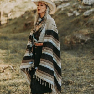 These versatile Southwest blankets are perfect to spice up your living space.  Lay it over the bed or patio furniture, use as an accent floor rug, wall tapestry or take it on your weekend adventure.  