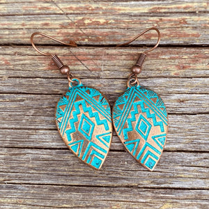 You’ll be the envy of you besties in these Navajo inspired earrings.  Artisan made. Mexico.  Etched Aztec design with gorgeous patina blue on copper.  Lovely weight and size to wear all day.