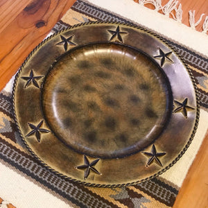 Enhance your decor with this round iron charger with star and rope accents and a rustic, antiqued finish. These serving trays work perfectly in any rustic entertaining situation, and would be great to hold remote controls, mail, or other items. Not intended for food use.    Perfect ffor your bedroom to display that western jewellery collection