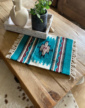 These beautiful hand loomed table mats are the perfect thing to spice up your table, sideboards, place settings, walls, anywhere and everywhere.  Each table mat is handmade by Mexican artisans from hand dyed 100% wool, measuring approximately 16x20".