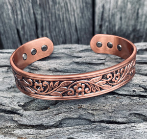 Nicely weighted solid copper cuff bracelet!   Western style engraving with 6 magnetic inlays (considered for holistic health benefits)