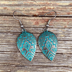 You’ll be the envy of you besties in these Navajo inspired earrings.  Artisan made. Mexico.  Etched Aztec design with gorgeous patina blue on burnished silver.  Lovely weight and size to wear all day.