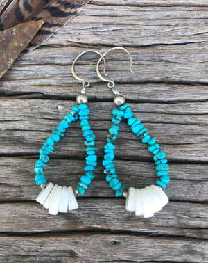 The Stones: A pair of round Kingman Turquoise stones with an striking matrix of teal azure and golden hues.  The Style: Vintage, hand-crafted concho stud and drop pendant setting. Artisan made in New Mexico in pure ‘oxidised/patina ’ sterling silver. Stud fitting with custom .925 clasps.   Petite size, these are understated and easy to wear everyday.