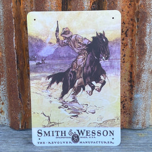 How cool is this!! Wall Art.   The famous Smith & Wesson Arms Company  Vintage Western Wall Art. Perfect for any room, stables or business. Larger than all the regular tins, it’s a big W30xL40cm, with four corner small screws holes ready for the wall or plaque.