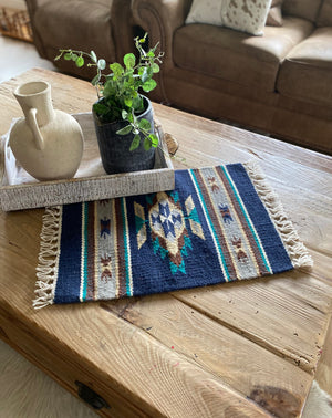 These beautiful hand loomed table mats are the perfect thing to spice up your table, sideboards, place settings, walls, anywhere and everywhere.  Each table mat is handmade by Mexican artisans from hand dyed 100% wool, measuring approximately 16x20".