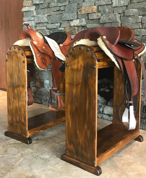 Display your Pride and Joy on this custom saddle stand, made here at Swan Creek in 🇦🇺 Solid Pine   Photos (high finish) Smokey oak blend stain with satin-poly finish. Top mount or full front Clavos - genuine Mexican nailhead accent. Comes with under rail hook.  Size 740mm High x 740mm Long x 320mm Wide  We make these to custom order - usually within the same week. (Christmas orders and events times may vary)  Options with variations of shapes for plaque mount, stain and painted finish available. By quote.