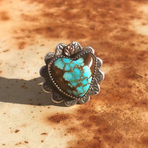 Get your hands on this Stunning Vintage Ring.  Gorgeous * very rare * vintage #8 Mine Turquoise carved into a 3/4" Southwest ring. 22mm polished heart cabochon set in handmade sterling silver rose petal setting with 18K Rose Gold accent!  Top Notch. One of a kind collectors item to be worn, admired and treasured.  Size 7.5 AUO (Medium) see our ring guide. @swancreekinteriors