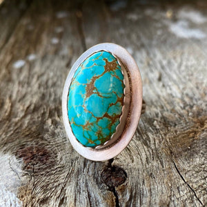 Collectors Turquoise. One of a kind. Exquisite.  Gorgeous rare #8 Turquoise cabochon from Nevada set in oval sterling silver setting. Large 25x16.5mm stone with exquisite sky blue colour and matrix spider webbing.  Artisan made in New Mexico