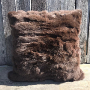 Wild West  This luxe pillow will add an western elegance to your home. Dark chocolate rabbit fur creates the perfect rustic touch.   Handmade by Mexican makers it’s filled with an luxury duck feather inner.  It’s hard to tell it’s a replica, this fluffy ‘faux’ rabbit fur is super soft to the touch and feels great. 