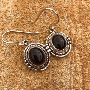Western Black Onyx beauties!  Designed by Roxy West; with style and comfort in mind.  Handcrafted in silver with timeless ‘rope & bead’ silver work that frames polished gemstones.  Lovely .925 Sterling silver. Natural gemstones. Pendant size 15 x 17.5mm.