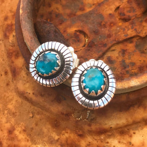 Southwest Stunners! Super Rare Teal!  Natural teal blue Fox Turquoise stones from Nevada .65" in overall length.  The Style: Natural shaped setting with full Southwest etch work. Artisan made in New Mexico in pure sterling silver. Stud fitting with vintage butterfly clasps. Measures 10x8mm. These silver stud earrings are made to be comfortably worn, loved and admired.