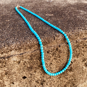 Sleeping Beauty stones are some of the most desirable gemstones produced in the world  Sleeping Beauty Turquoise (old stock) from the now closed Sleeping Beauty mine in Globe, Arizona. Luxury necklace of delicate 3.5mm round beads, strung with solid 14K Gold finding and clasp. 17.5" length, delicately finished necklace.