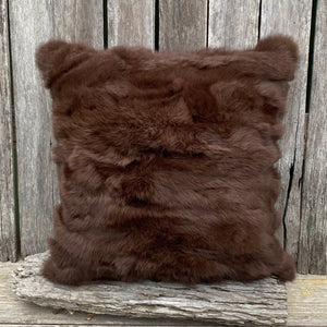 Wild West  This luxe pillow will add an western elegance to your home. Dark chocolate rabbit fur creates the perfect rustic touch.   Filler with luxe duck feather inner.
