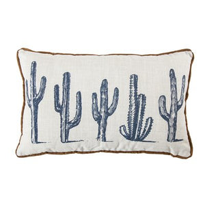 Restocked this very popular cushion  All the way from Dallas TX.  This 5 Cactus Pillow pays homage to the old west with an updated twist. With a background of muted white the deep blue cactus really pop. This look is finished with a faux suede piping in a deep copper.  Material: Linen. Filling: 100% luxurious waterfowl feathers.  Hidden zipper closure. 