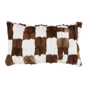 The fluffy pillow to end all fluffy pillows. This cushion is crafted from genuine goat hide and stitched together to create a unique ‘patchwork’ style. We sourced thus beautiful cushion from Dallas TX. You will find exact cushion styled in luxe ranches, Cowgirl magazines and Western boutiques.   Luxurious large goat hide cushion. Measures 16" X 26".  100% goat fur/hide, backing plush Suede. Filled with 100% waterfowl feathers. 