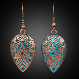 You’ll be the envy of you besties in these Navajo inspired earrings.  Artisan made. Mexico.  Etched Aztec design with gorgeous patina blue on copper.  Lovely weight and size to wear all day.