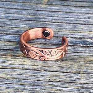 More delicate than the cowboys cuff, however still a nicely weighted solid copper. Western style embossed with 6-8 magnetic inlays (considered for holistic health benefits).   Vintage ~ patina finish  Polished ~ hi-polish finish  Antiqued ~ yes it’s copper with antique silver finish