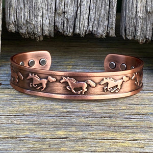 Nicely weighted solid copper cuff bracelet!   Western ‘running horse’ embossed design with 6 magnetic inlays (considered for holistic health benefits)