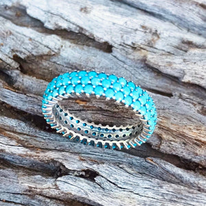 Dazzling Turquoise 3 Tier rings.   Sparkling beauties, these wider rings look gorgeous on any finger.   Triple band of bright blue Turquoise stones. Made in .925 silver. 