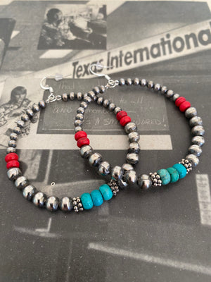 Our newest Tonopah collection  Gorgeous Navajo Pearls (treasured desert accents) of natural Kingman Turquoise and red coral Açai.  Beautiful Dramatic earrings! Navajo Pearls are 4mm and 6mm. Large 2 " inches in length. Sterling silver French wires.