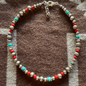 Our newest Tonopah collection  Gorgeous Navajo Pearls (treasured desert accents) of natural Kingman Turquoise and red coral Açai.  The Necklace with 6&8mm pearls on short, choker style 14 inch strand. The clasp comes with a 1" extension chain to fit different necks.