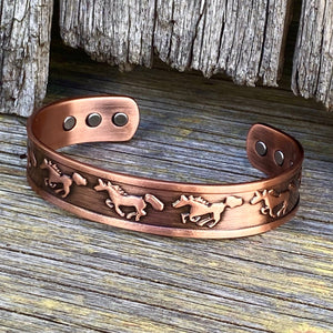 Nicely weighted solid copper cuff bracelet!   Western ‘running horse’ embossed design with 6 magnetic inlays (considered for holistic health benefits)
