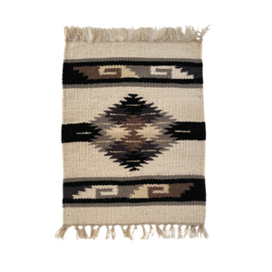 These beautiful hand loomed table mats are the perfect thing to spice up your table, sideboards, place settings, walls, anywhere and everywhere.  Each table mat is handmade by Mexican artisans from hand dyed 100% wool, measuring approximately 16x20".  Due to the handmade nature, no two table mats will be perfectly identical. We think this makes these extra special.