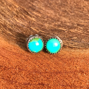 Gorgeous 100% natural turquoise from Sonora, Mexico with stunning natural lime green and bright blue colour! Elegant 9mm stone size.  Handcrafted earrings with decorative Princess bezel, elgant .35".  Uniquely stunning pair of studs! .925 sterling silver with artisan silver butterfly back. One of a kind. Silver maker/Artisan New Mexico. @roxywestau @swancreekinteriors