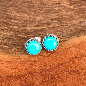 Southwest Beauties!  Gorgeous 100% natural South Hill Turquoise from Nevada with stunning bright blue colour!  Elegant 8mm stone size.  Handcrafted earrings with decorative Princess bezel, just under .4" (inch). Uniquely stunning pair of studs! .925 sterling silver with artisan silver butterfly back. One of a kind. Silver maker/Artisan New Mexico. @roxywestau