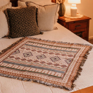 Woven Indian textile to add that touch of Southwest flair to any room of your home or gooseneck.  Perfect for draping over the back of the chair, table or bed. Cute in the nursery too.  This lovely 90x90 throw features; traditional pattern and fringed ends.  Double sided, reverse colour & design.  Interior gorgeousness!!