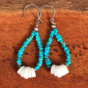 Beautiful natural Lone Mountain Turquoise beads from Nevada strung with corn shaped white Spiny Oyster in Jacla style. Pure .925 sterling silver beads and wires. 2.5" in length overall. 100% natural shell found off the coast of Baja and 100% natural American Turquoise!  @roxywestau